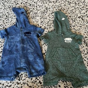 A pair of Roots hooded rompers. 6-12m